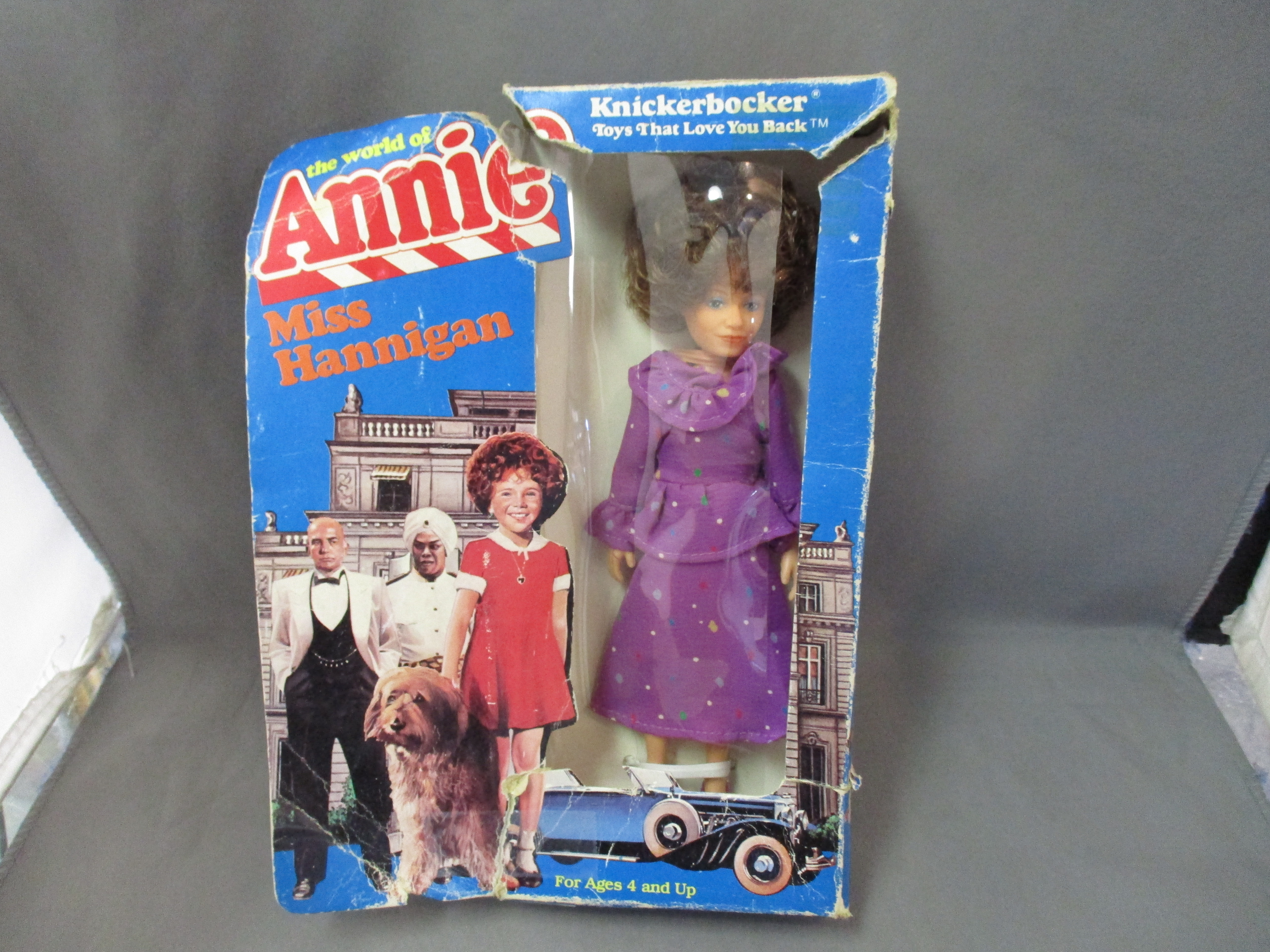 Knickerbocker The World of Annie: Miss Hannigan