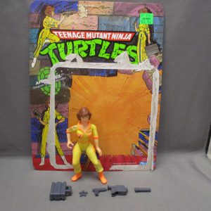 TMNT April O'Neil (orange strip press badge)